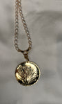 Double sided floral pendant